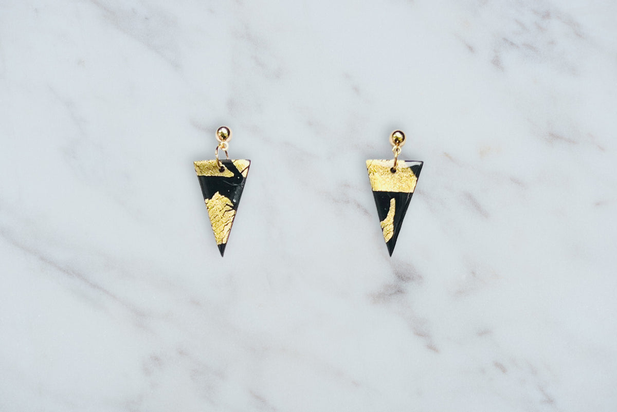 Little triangle (black)